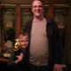Fuzzy picture of extraordinarily happy chili cook-off winner and his helper